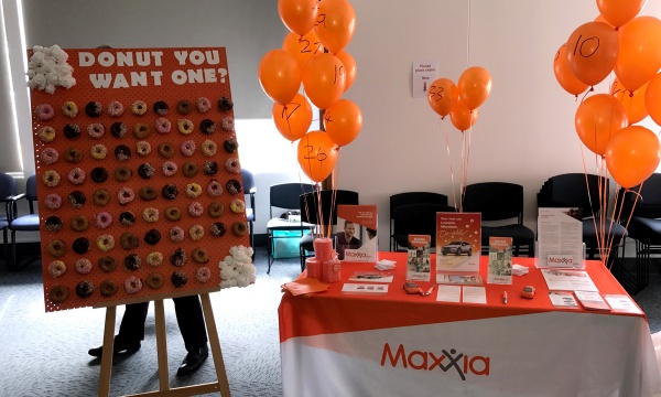 Maxxia event stall with donut wall